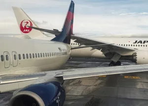 Japan-Airlines-and-Delta-Planes-Collide-During-Taxiing