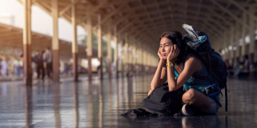 Asia,Woman,With,Bag,Backpack,And,Sitting,Bored,Wait,A